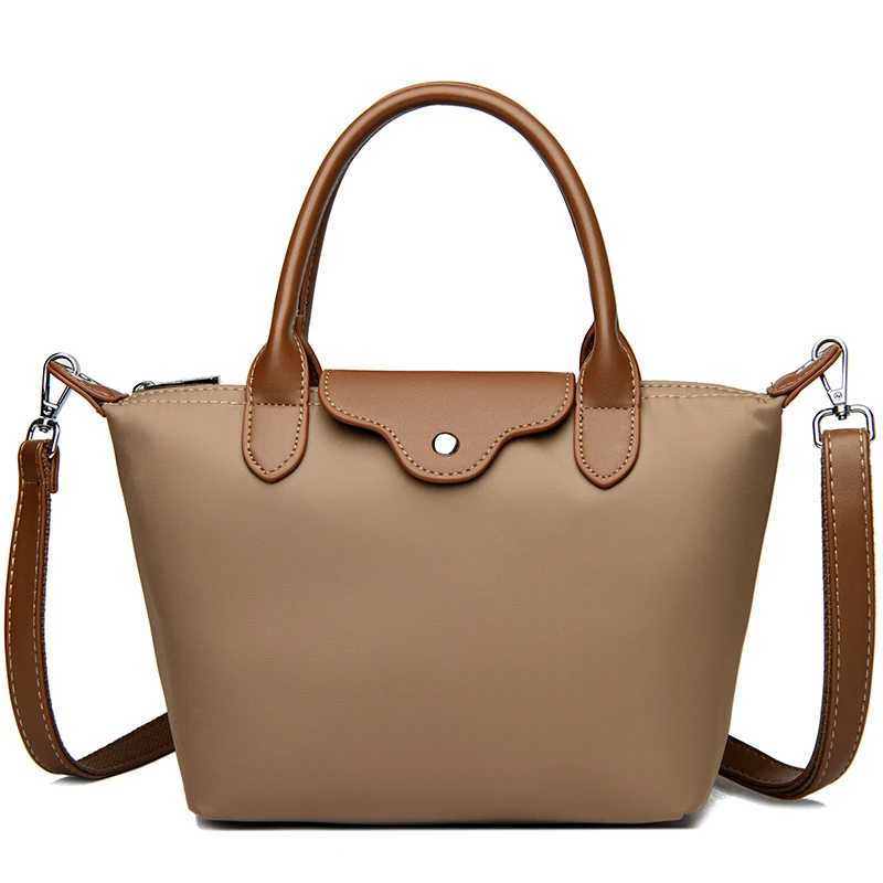 Luxury waterproof womens bag 2025 summer new messenger bag womens simple waterproof soft cloth shoulder bag W250421
