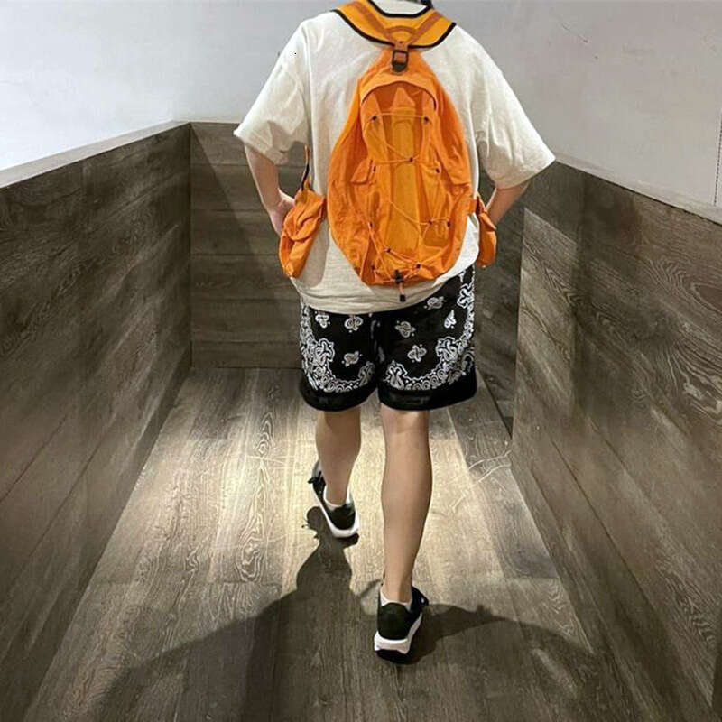 Askyurself military fabric washed worn, cashew flower print trendy brand hip-hop and pop loose shorts, men's five quarter pants
