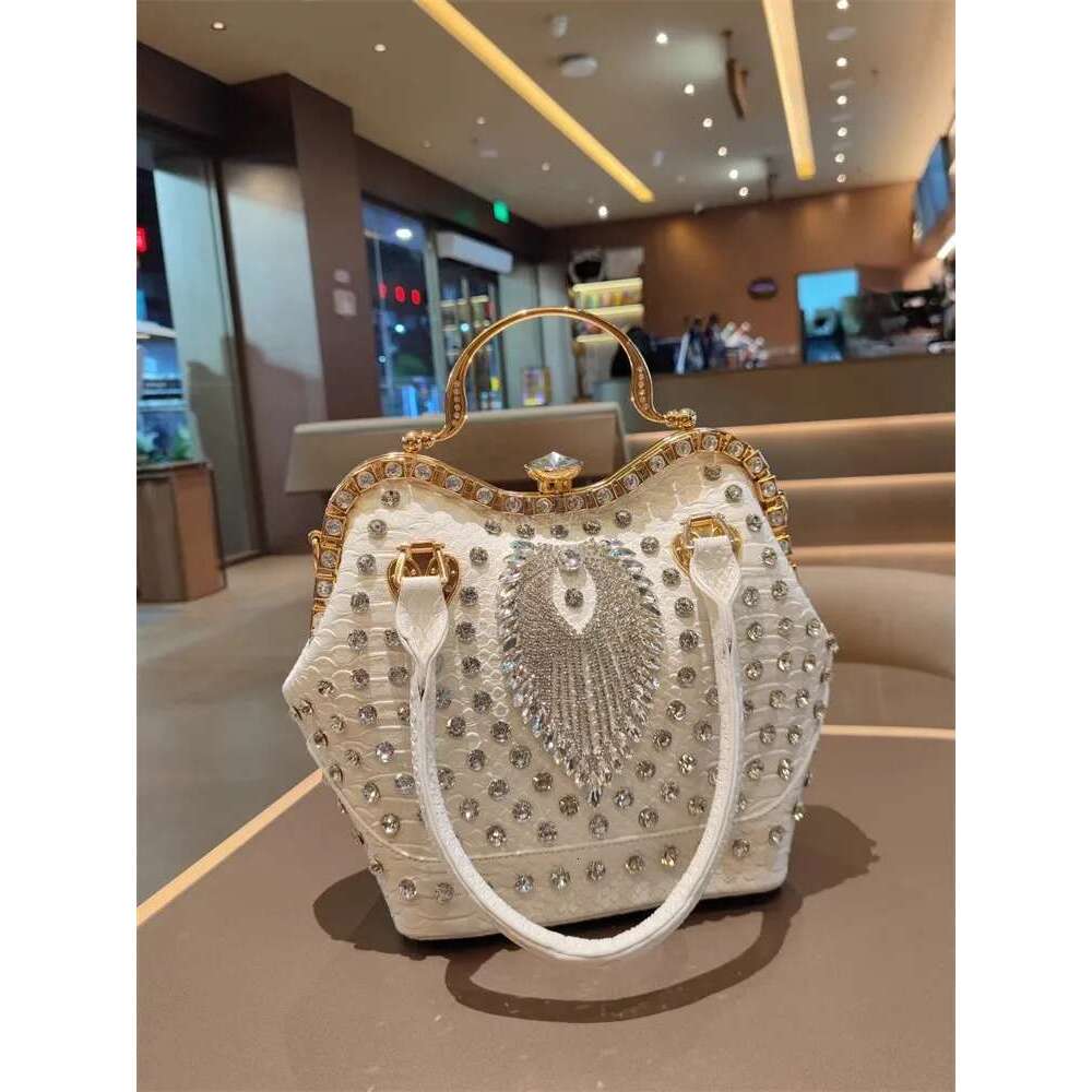 Spring new rivet crystal vertical large-capacity metal buckle handbag banquet dress versatile one-shoulder cross-body women bag