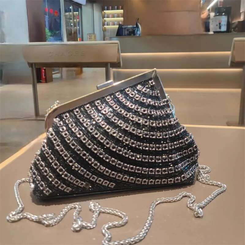 Spring and summer new metal frame rhinestone clutch crystal banquet dress chain handbag one-shoulder cross-body women's bag