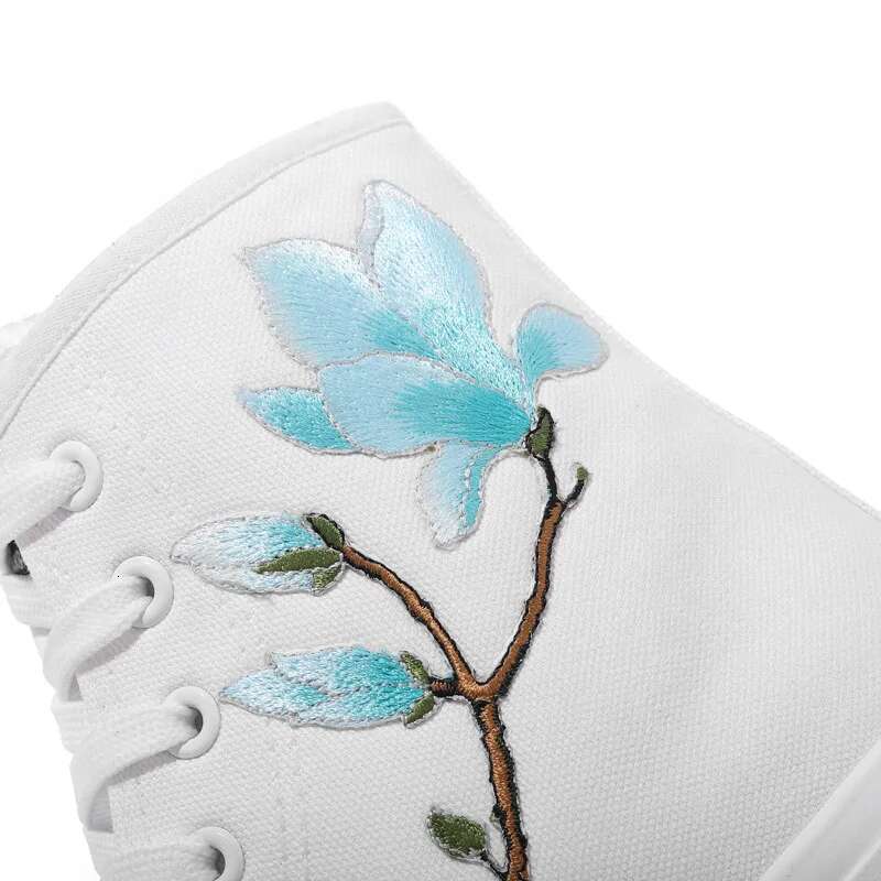 Spring new embroidered lace-up side zipper high-top couple canvas casual flat inner heightening large size women's shoes
