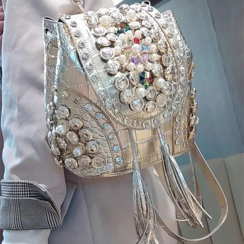 Spring new PU large-capacity pearl rhinestone rivet cross-body backpack casual tassel chain one-shoulder underarm women's bag