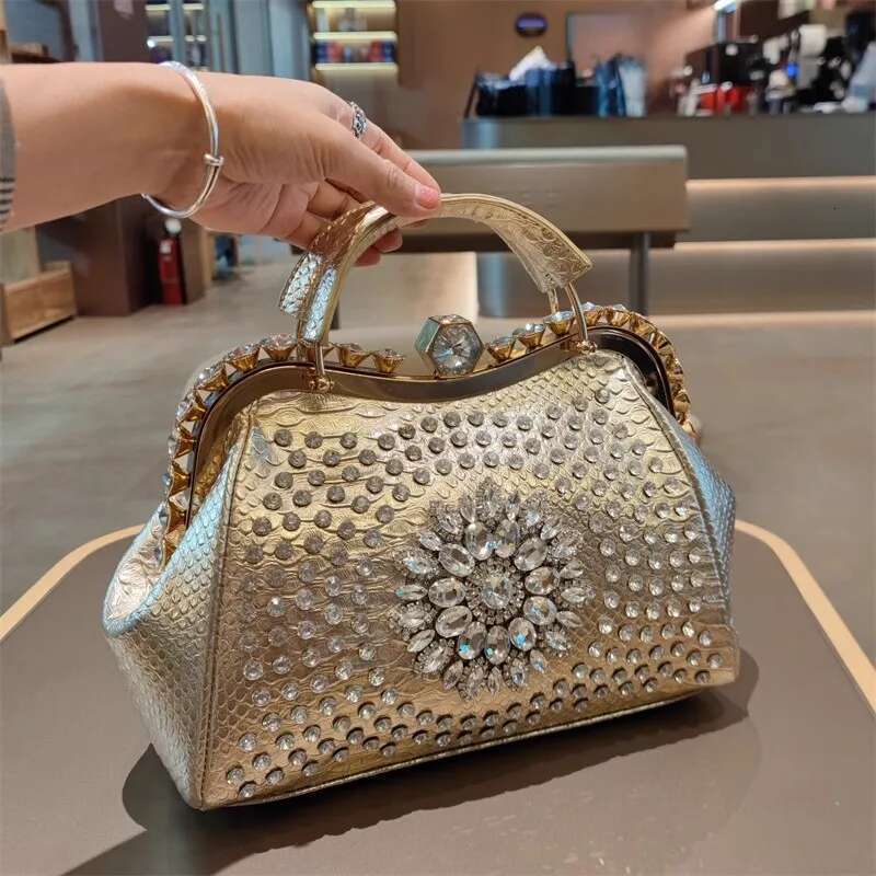Spring new rivet crystal horizontal large-capacity metal button handbag banquet dress one-shoulder cross-body women's bag