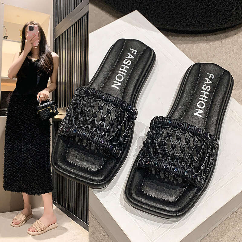 Trendy brand niche high-end cool summer outdoor wear, new temperament, flat bottomed woven beach slippers for women