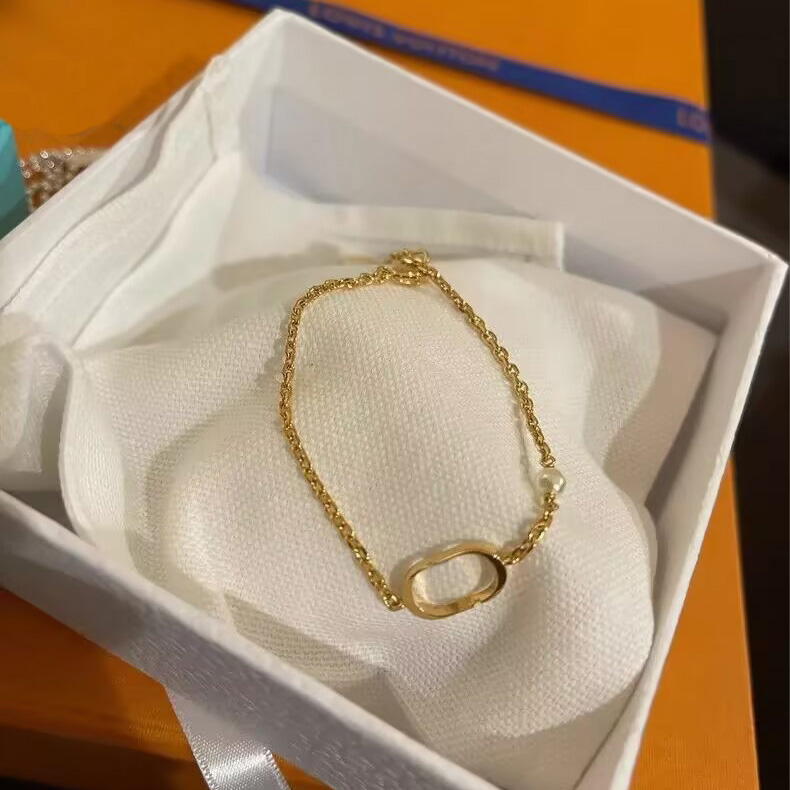 Gold-Toned Bracelet With Sleek Oval Accent And Dainty Pearl Detail Delicate Daily & Elegant Jewelry Gift For Her High-Quality And Stylish Accessory