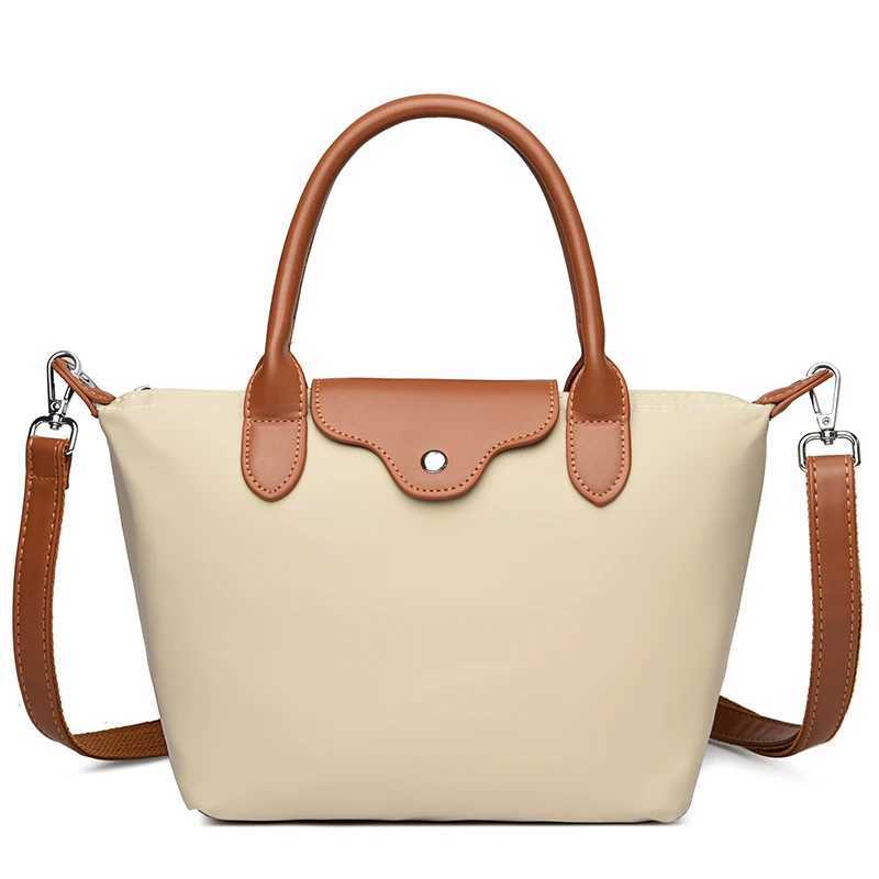 Luxury waterproof womens bag 2025 summer new messenger bag womens simple waterproof soft cloth shoulder bag W250421