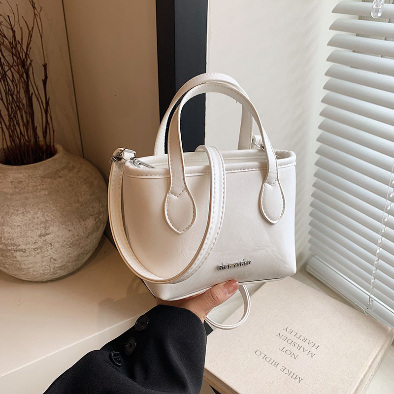 2025 New Designer Bag Free Delivery Shoes By Korean Casual Minimalist Texture Single Shoulder Hand-Held 2024 Summer Niche Design Crossbody Bucket Bag