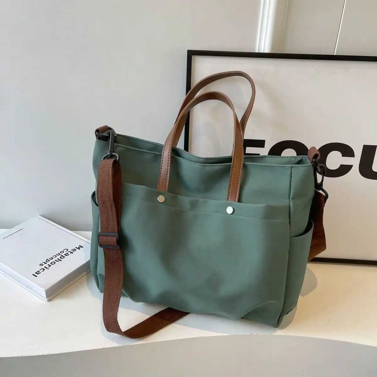 Womens multi pocket handheld handbag simple and stylish shoulder cross body bag lightweight and foldable shoulder bag W250421