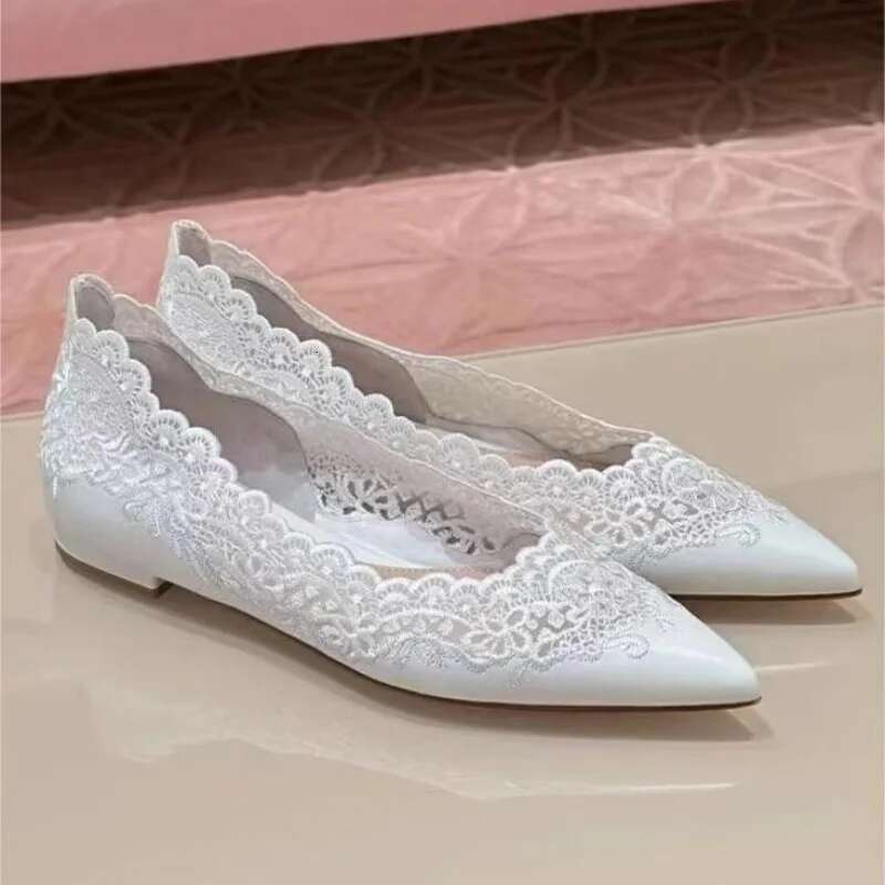 Spring and summer new pointed shallow lace hollow soft sole white wedding banquet dress versatile flat women's shoes