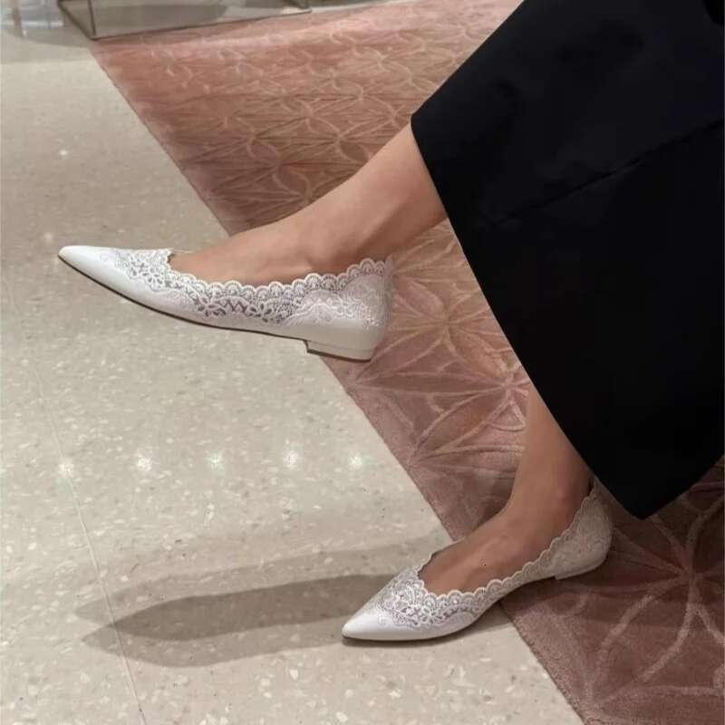 Spring and summer new pointed shallow lace hollow soft sole white wedding banquet dress versatile flat women's shoes