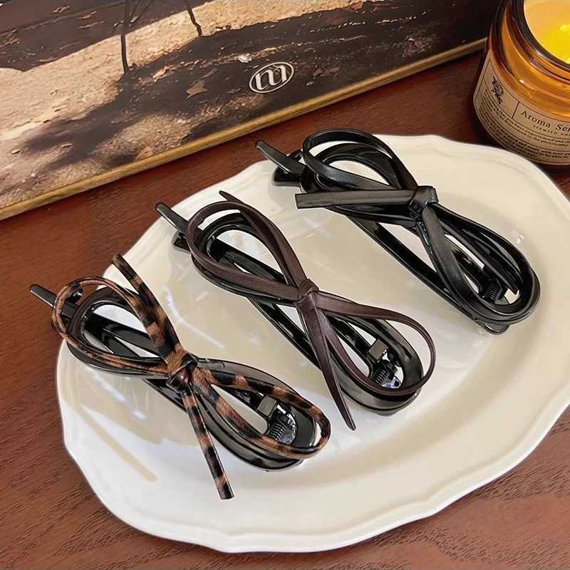 New twisted hair clip PU bow bucket large-sized hair clip plastic hair clip sweet daily headband female hair accessoriesT250425