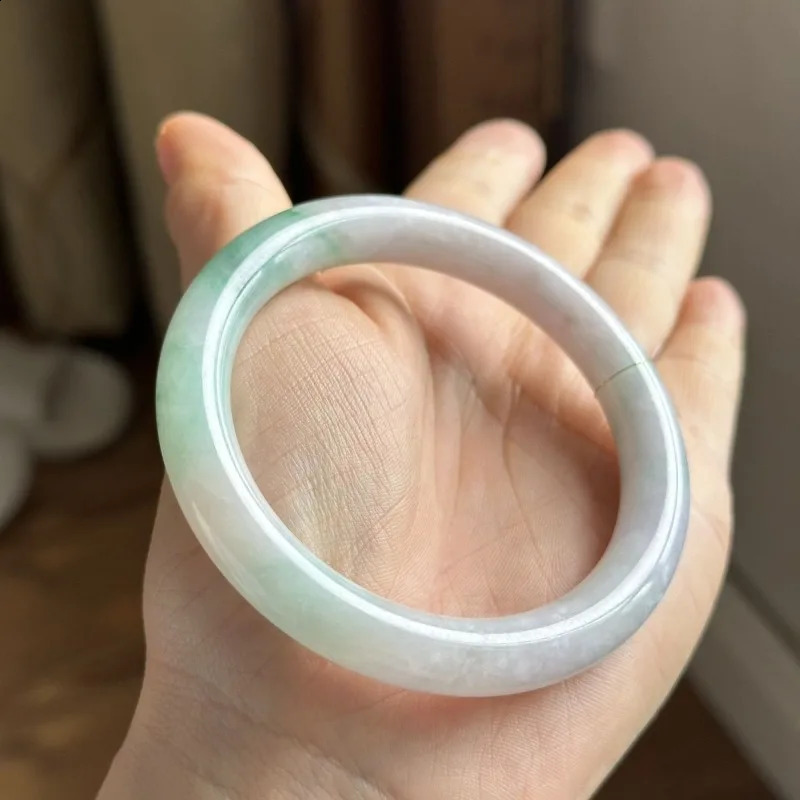 Floating green on a white background water round bar jadeite bracelet 250424
