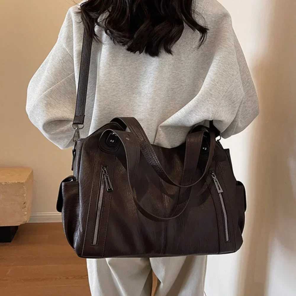 Soft indoor company shoulder bag 2025 high-quality contrasting color womens fashionable zipper Pu womens handbag W250421