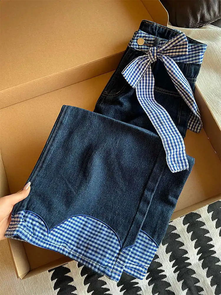 Oversized plain weave spliced jeans for womens spring high waisted loose and chic bow denim pants fashionable niche womens wide leg pants 250422
