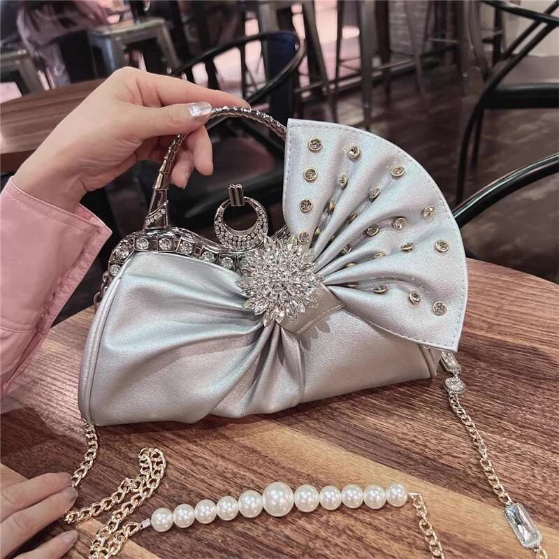 Spring and summer new rhinestone rivet wrinkled bow pearl handbag banquet dress one-shoulder cross-body chain women's bag