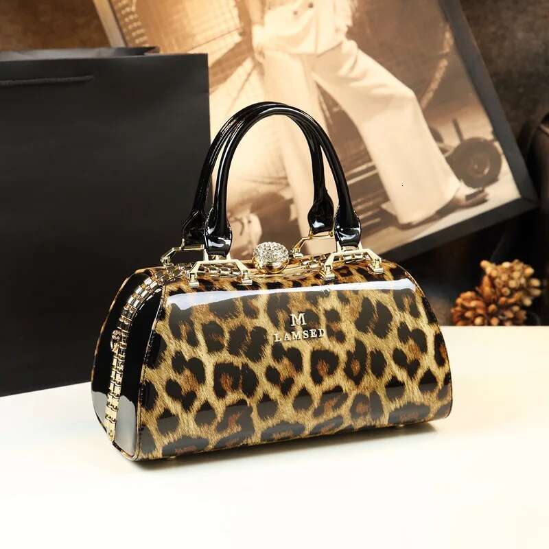 Spring new patent leather rhinestone buckle clip one-shoulder cross-body banquet dress daily pillow-shaped women's bag