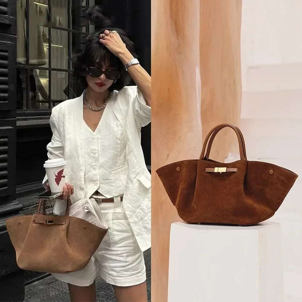 Luxury Designer Women's Designer Top With Magnetic Crossbody Wallet Handbag Handbagshoulder Strap Wings Bagdumpling Bag