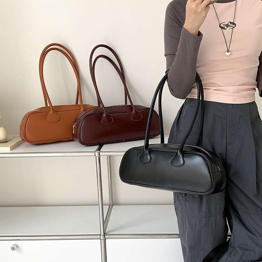 Korean niche French stick simple autumn shoulder women's high-end sense, large capacity commuting armpit bag, 2025 temperament versatile new tren