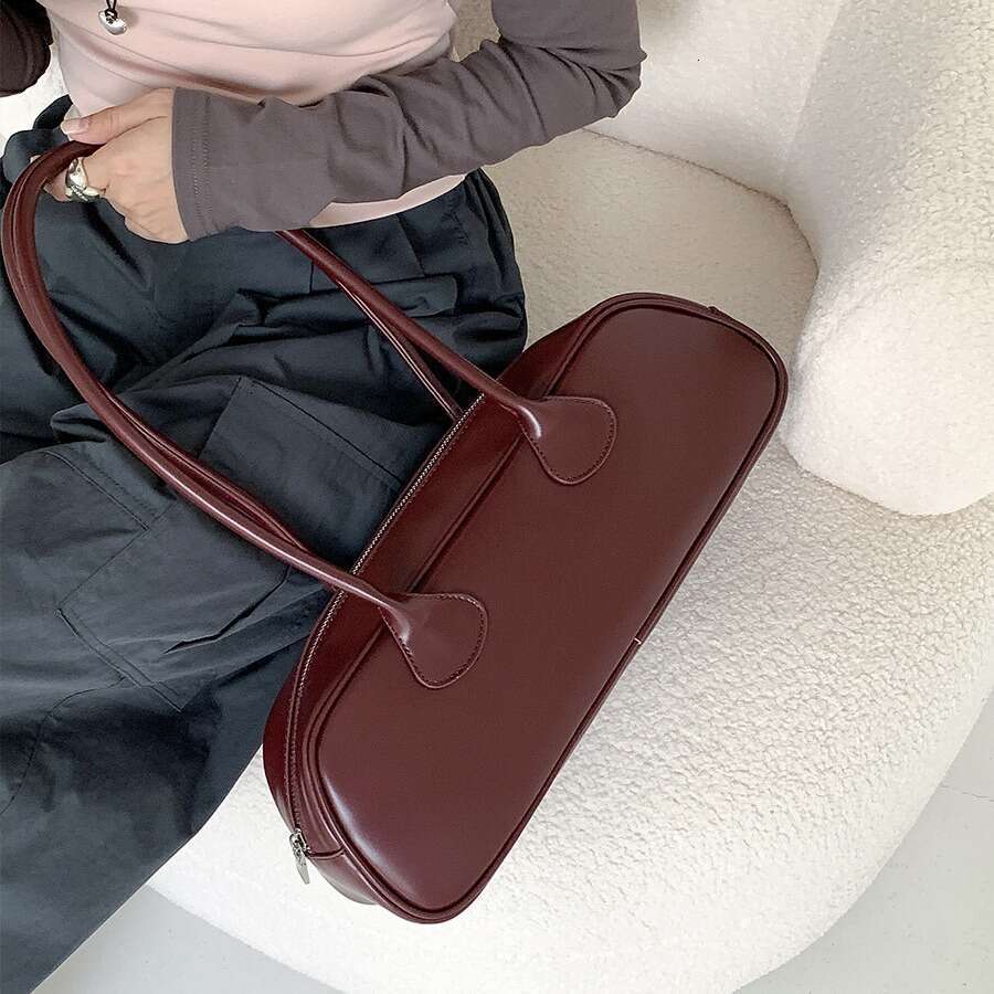 Korean niche French stick simple autumn shoulder women's high-end sense, large capacity commuting armpit bag, 2025 temperament versatile new tren