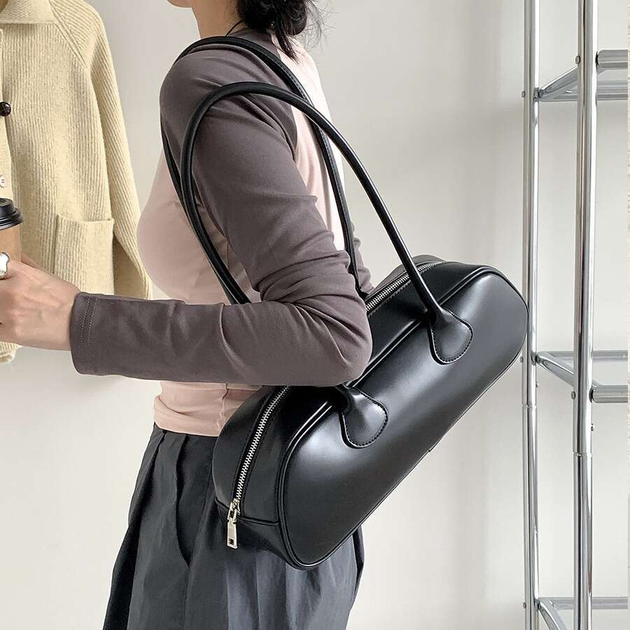 Korean niche French stick simple autumn shoulder women's high-end sense, large capacity commuting armpit bag, 2025 temperament versatile new tren
