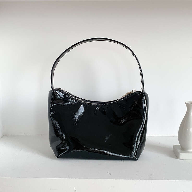Korean sier commuting style armpit women's simple fashionable handbag, high-end sense, niche and one shoulder dumpling bag, 2025 temperament vers