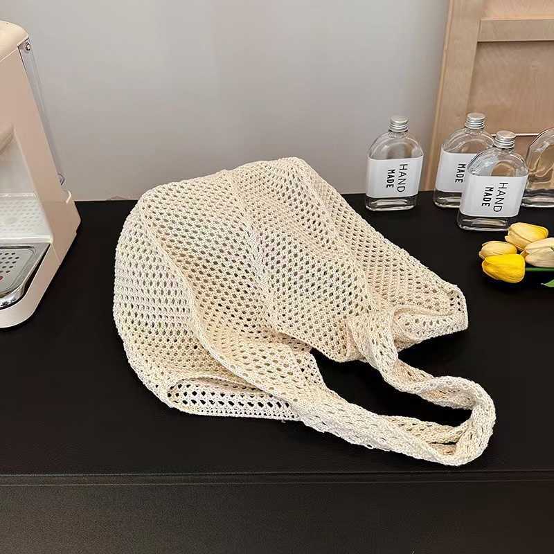 New Summer Trendy Woven Womens Bag Handheld Woven Bag Fashion Western Single Shoulder Mesh Bag Seaside Travel Straw Weaving