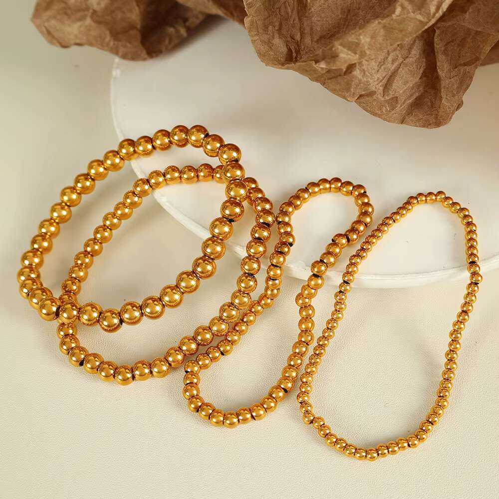 DHCollections JEWELRY SL60 Hot Sale Bean Beaded Hundred Titanium Steel Plated Gold Round Beads Stretch Bracelet