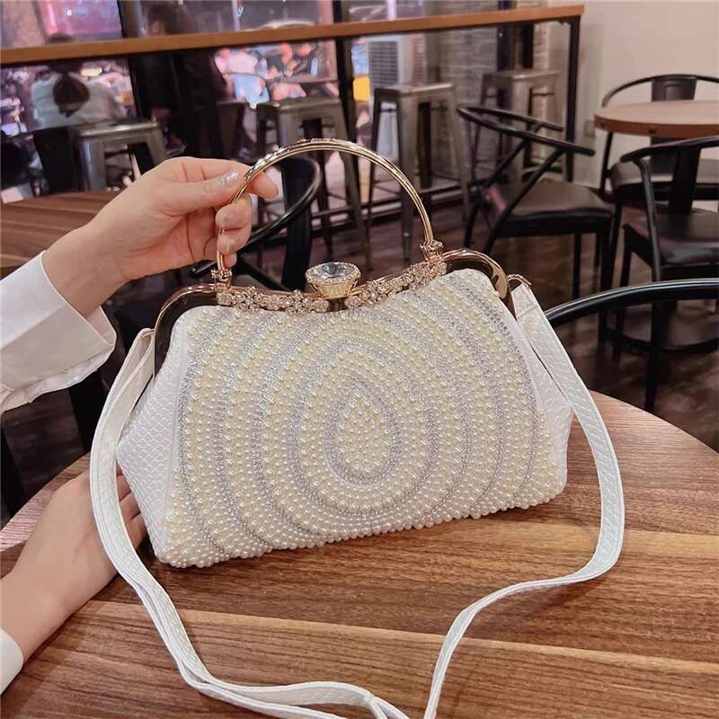 Spring and autumn new metal frame pearl dia rhinestone clip handbag daily large-capacity one-shoulder cross-body women's bag