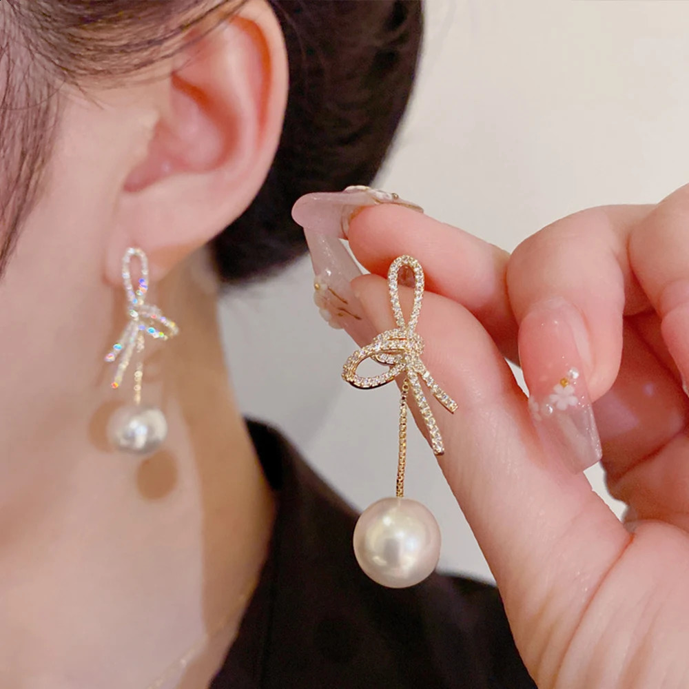 micro inlaid zircon bow hanging pearl earrings suitable for women to look slim 250422