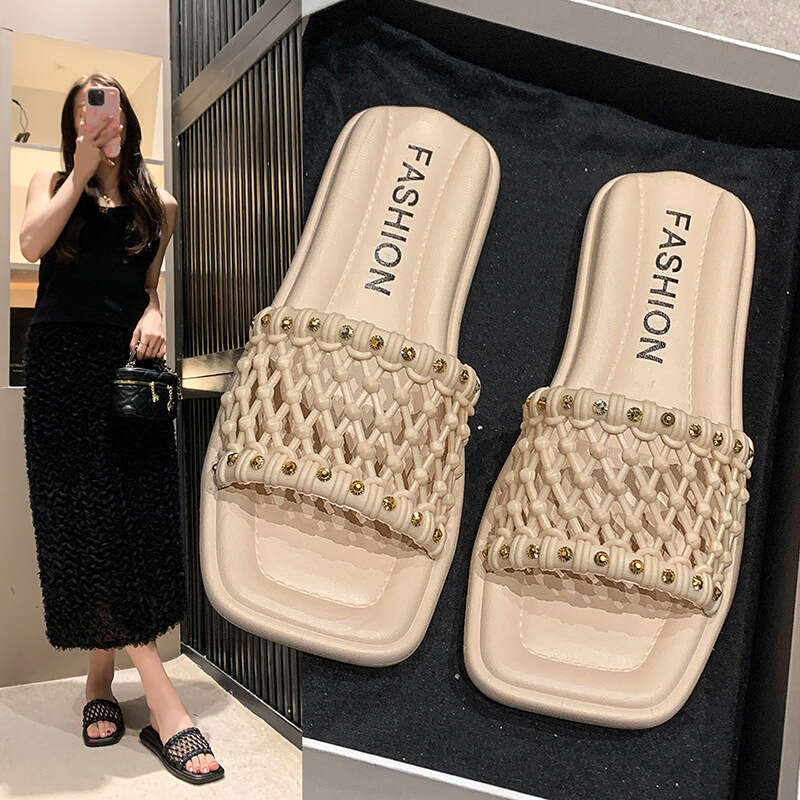 Trendy brand niche high-end cool summer outdoor wear, new temperament, flat bottomed woven beach slippers for women