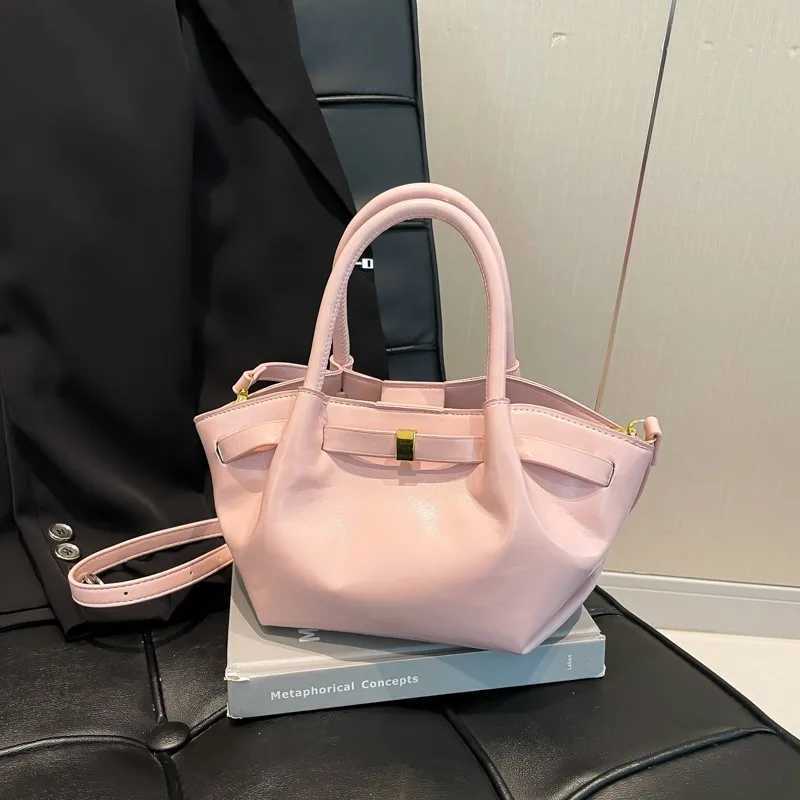 High end retro cross shaped bag suitable for women - fashionable leather messenger Parisian designer minimalist style solid color W250425