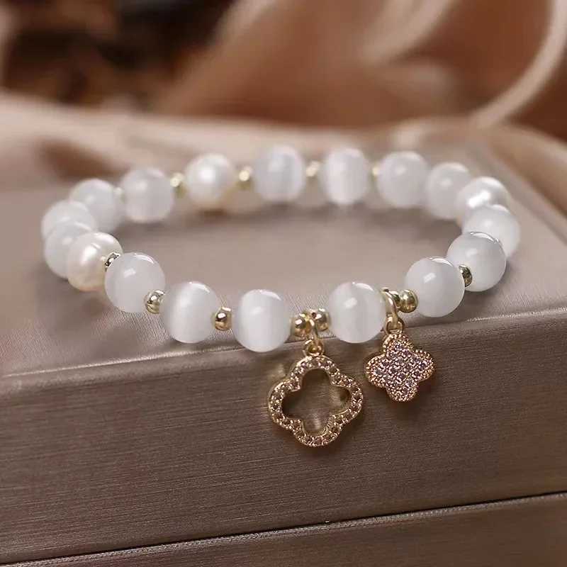 Womens Lucky Four-Leaf Flower Crystal Bracelet Elastic Rope Pearl Transfer Bead Hand Chain Jewelry Bangles Gift J251125