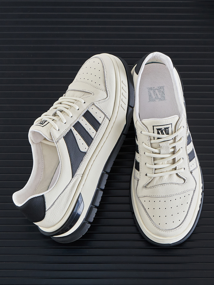 Head layer cowhide sports leisure men's shoes spring 2025 new non-slip thick bottom soft bottom male trend black and white board shoes men