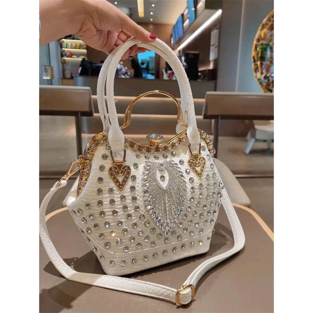 Spring new rivet crystal vertical large-capacity metal buckle handbag banquet dress versatile one-shoulder cross-body women bag