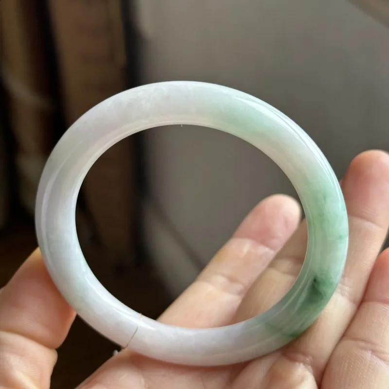 Floating green on a white background water round bar jadeite bracelet 250424