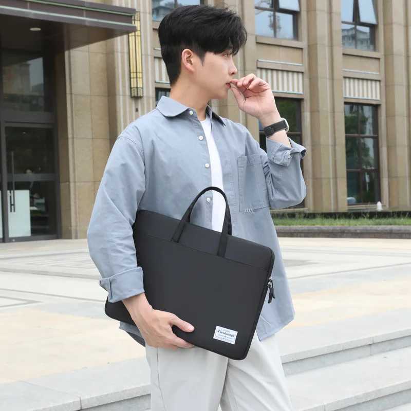 Fashionable and casual niche handbags simple and lightweight computer bags 2025 summer new fashion business bagsT251125