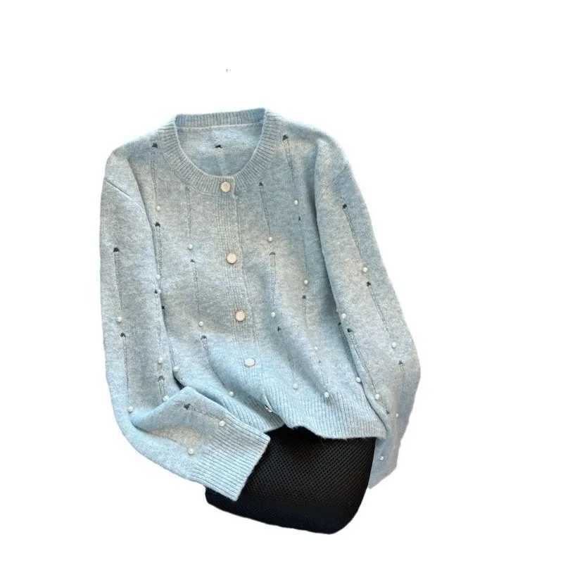 Autumn and winter new a retro style and a design sense Pearl hollow knitted sweater cardigan jacket women topT251125