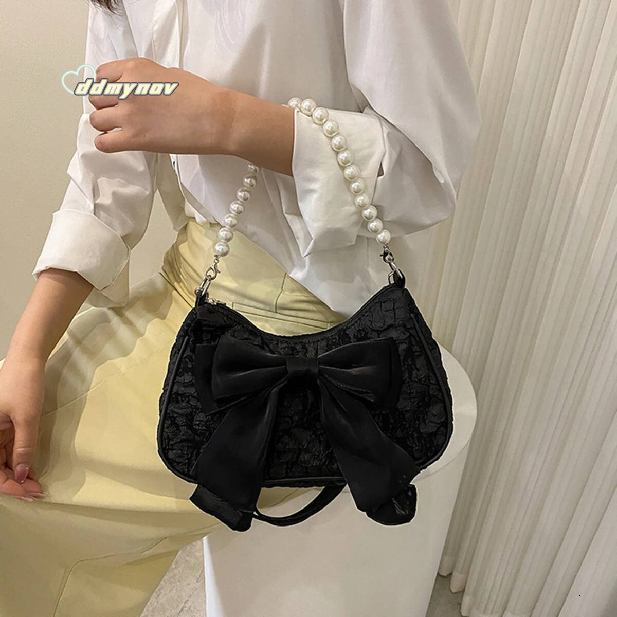 White folds pop retro bow Female Pearl handle New fashion pearl armpit shoulder crossbody bag 1 outfit ddmynov