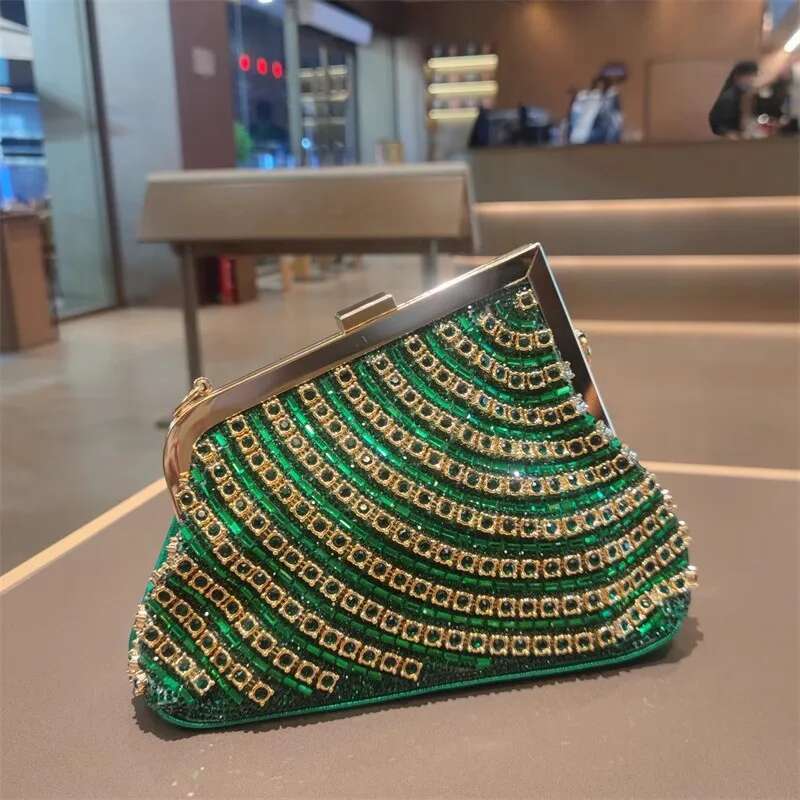 Spring and summer new metal frame rhinestone clutch crystal banquet dress chain handbag one-shoulder cross-body women's bag