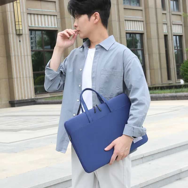 Fashionable and casual niche handbags simple and lightweight computer bags 2025 summer new fashion business bagsT251125