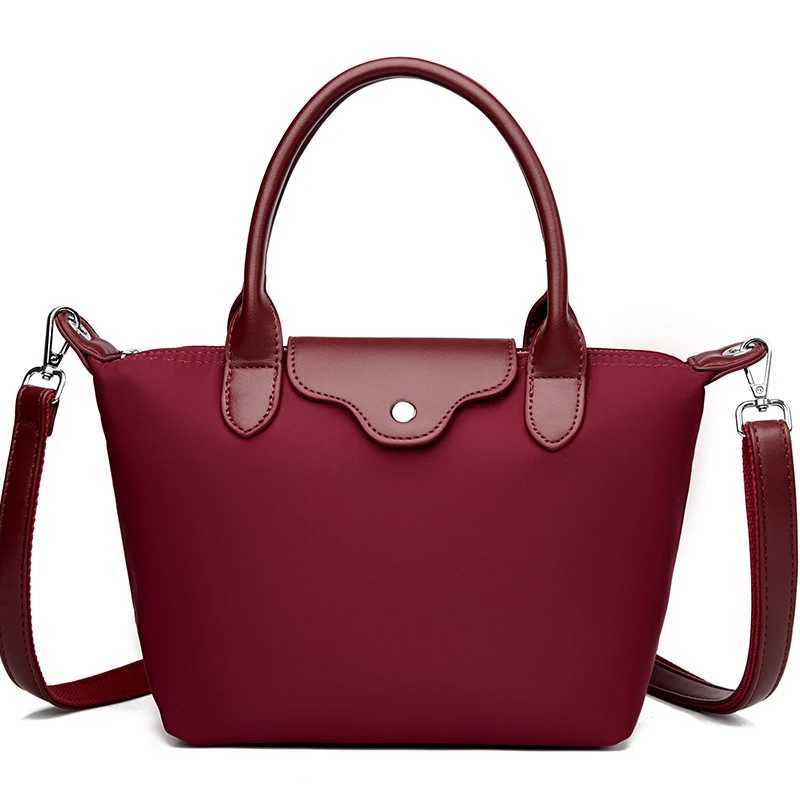 Luxury waterproof womens bag 2025 summer new messenger bag womens simple waterproof soft cloth shoulder bag W250421