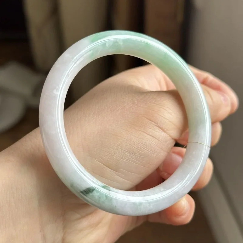 Floating green on a white background water round bar jadeite bracelet 250424