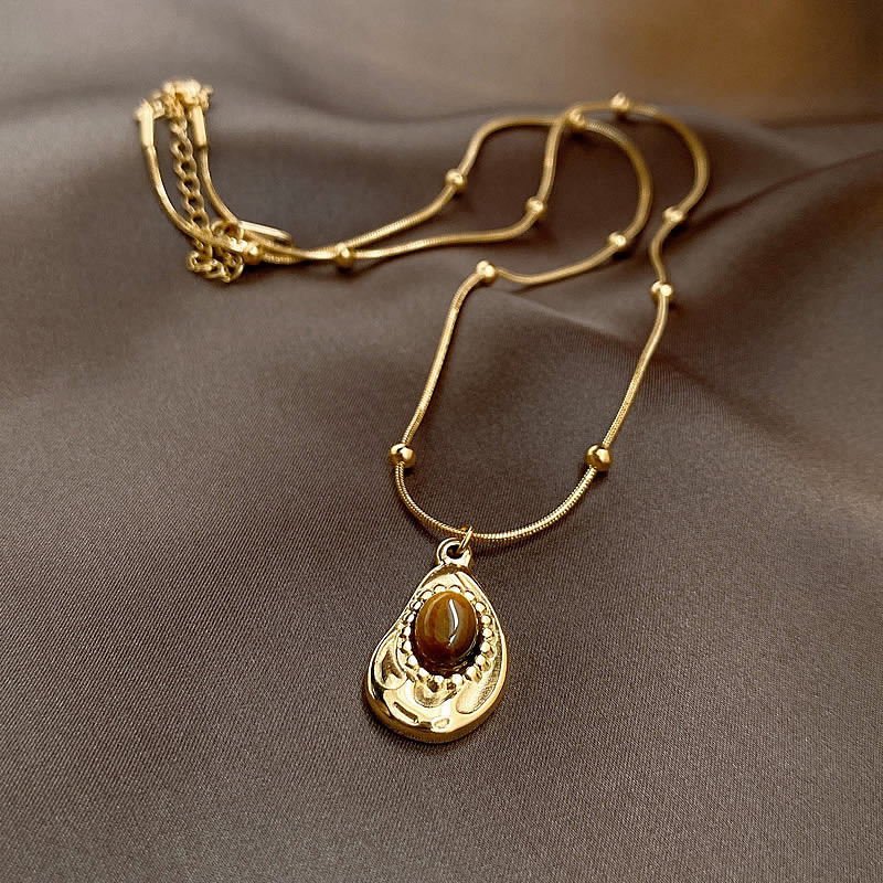 TaiYang 2025 New Maillard Style Tiger Eye Vintage Bezel-Set Oval Tigers Eye Pendant, Copper Statement Necklace for Women with Retro Luxe Appeal