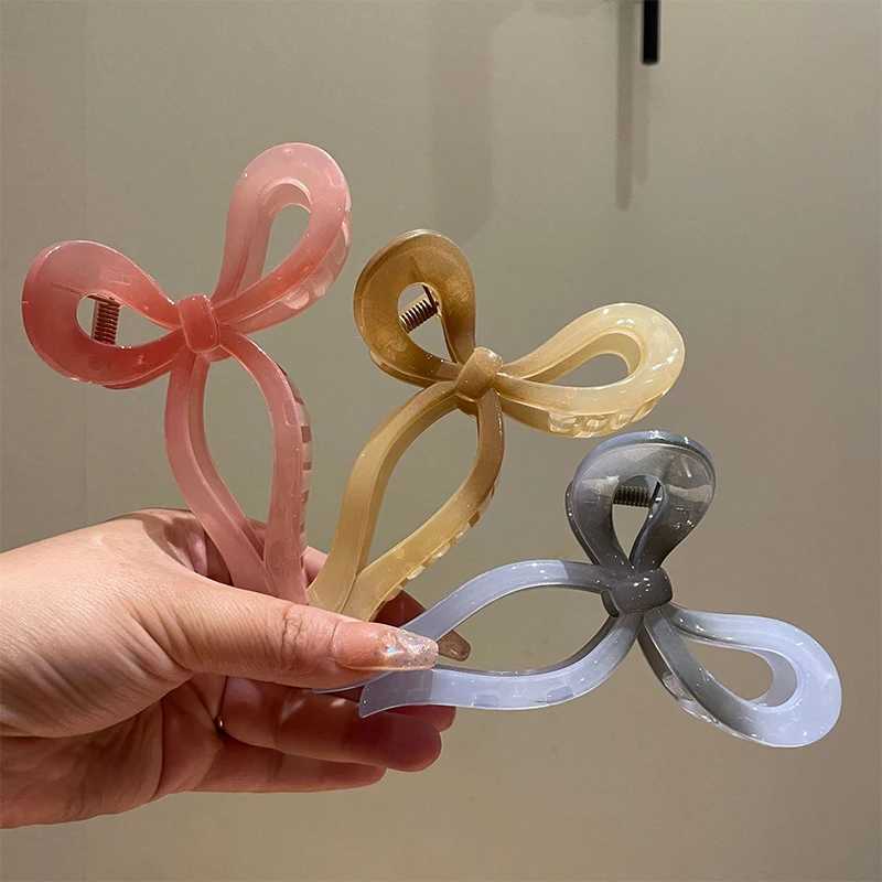 1 piece of colorful Ins hair clip womens back bow hair claw shark clip fashionable hair accessoryT250425