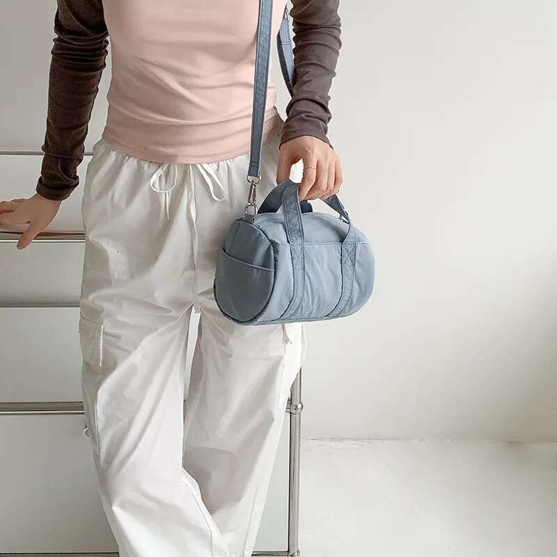 Designer Bag Sier Nylon Single Crossbody Summer Women's Casual Shoulder Tote Bag Cylinder Versatile Highend Fashionable Niche Handbag
