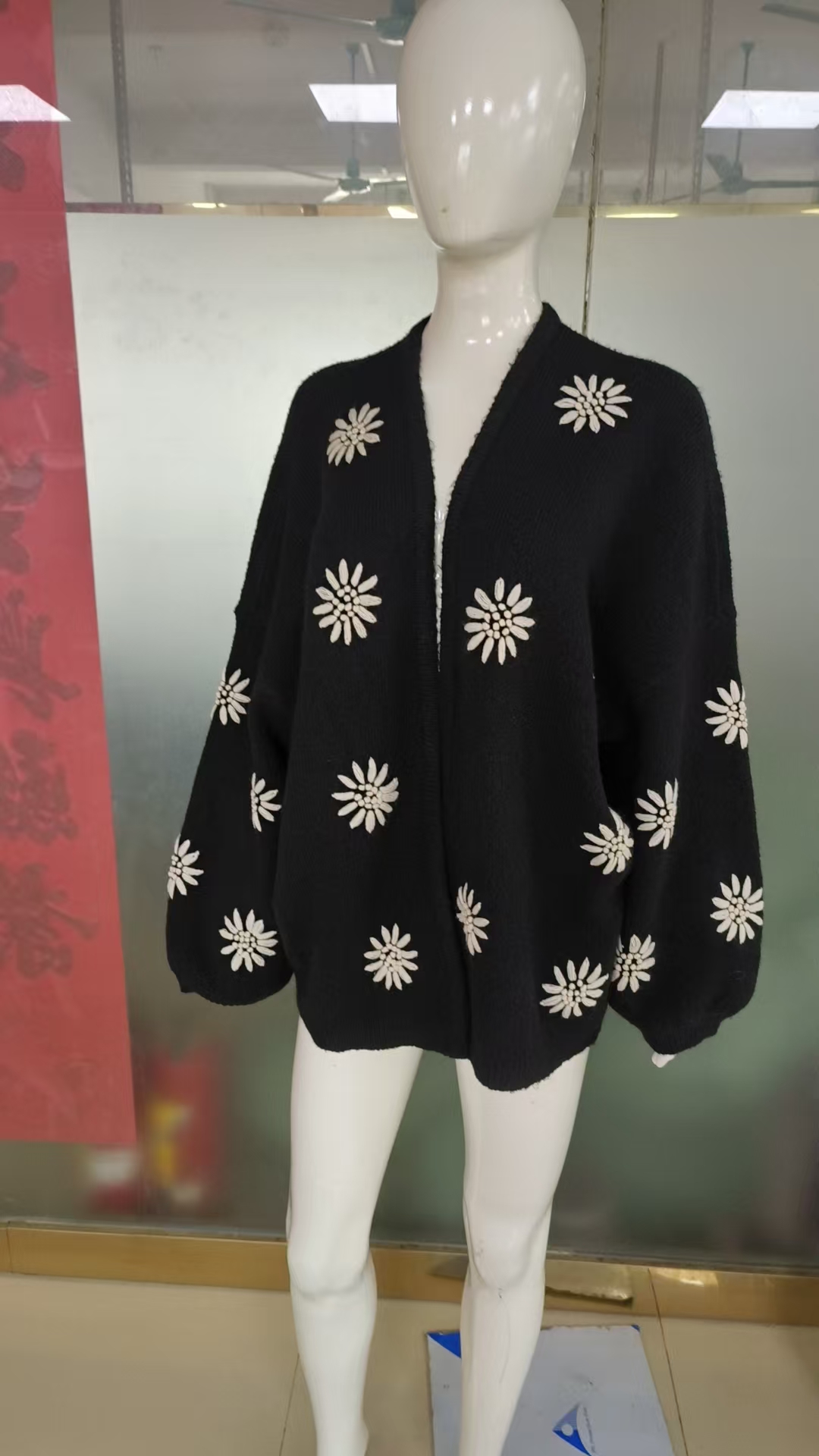 Stylish Knitted Ladies' Pullover with Intricate Stitching