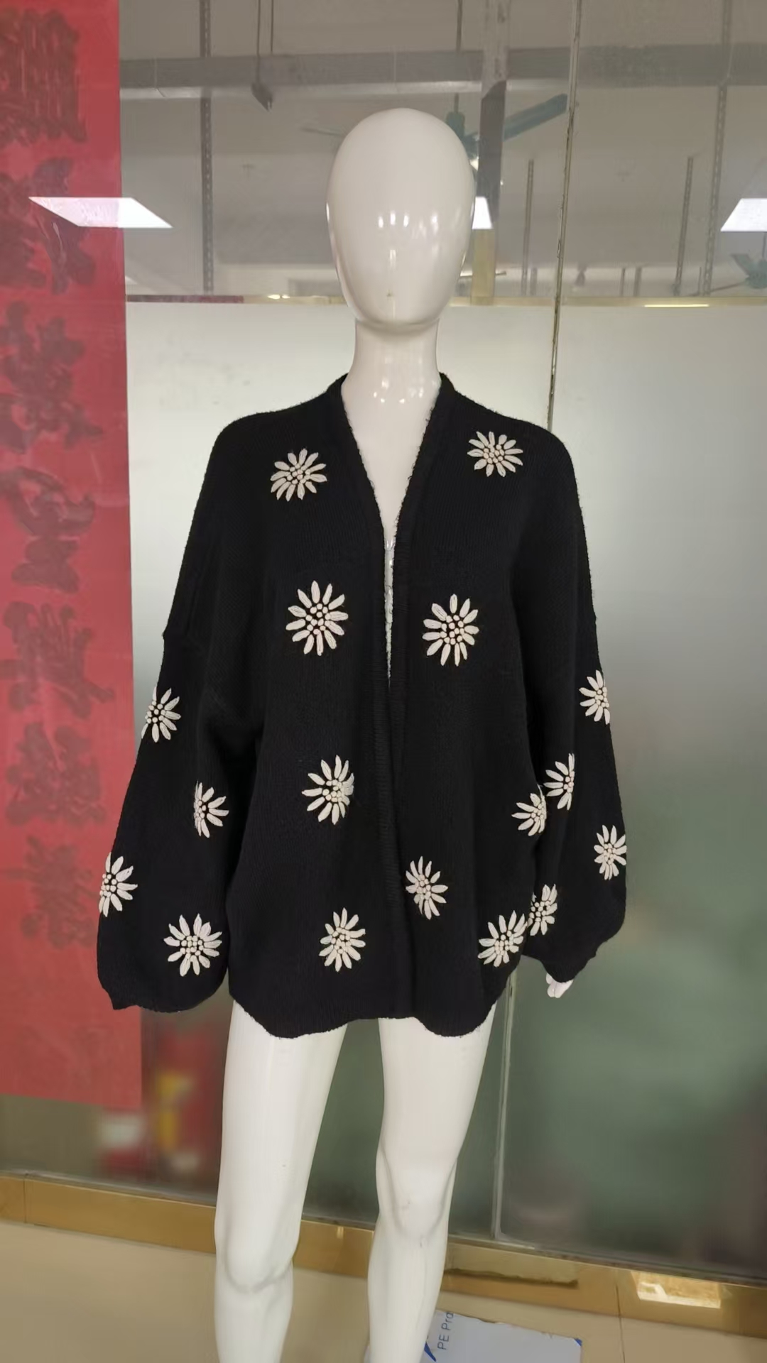 Stylish Knitted Ladies' Pullover with Intricate Stitching