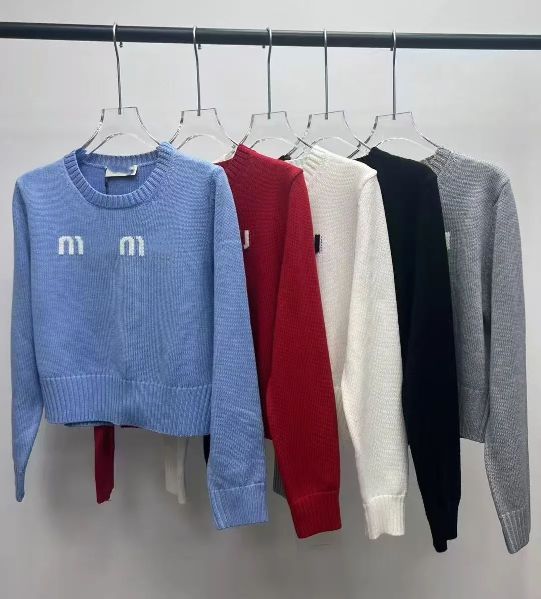 Paris designer autumn and winter new sweater shoulder buckle chest letter jacquard sweater loose top female street shoot