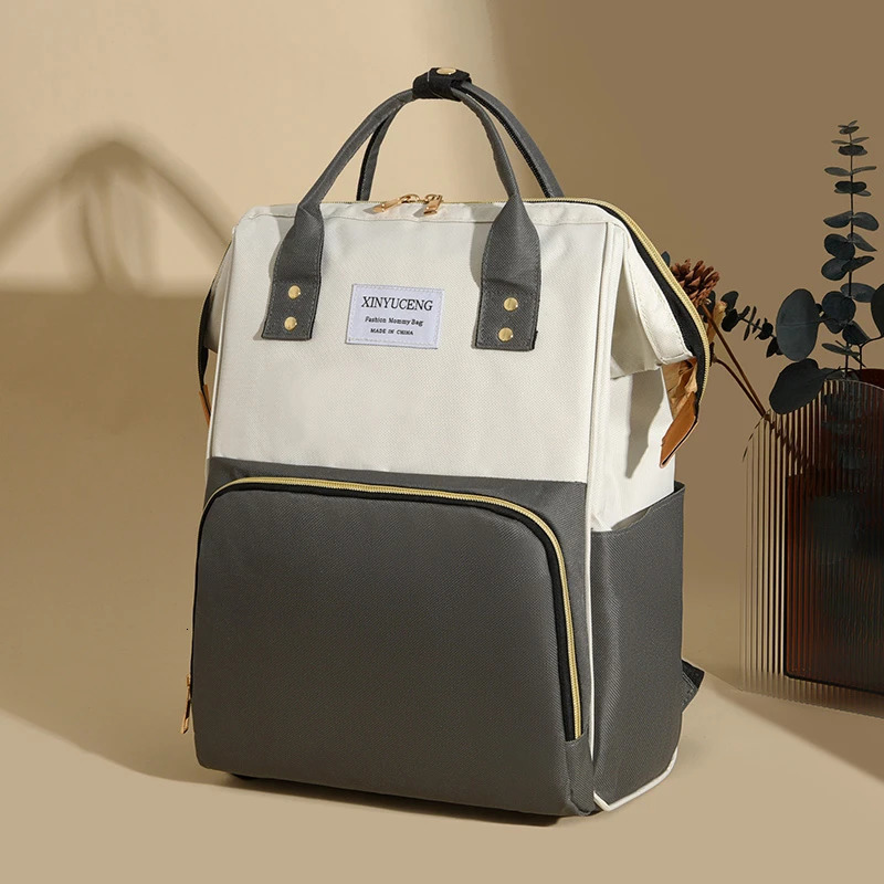 Multi functional maternity bag lightweight and convenient dial backpack large capacity baby care product storage 250414z