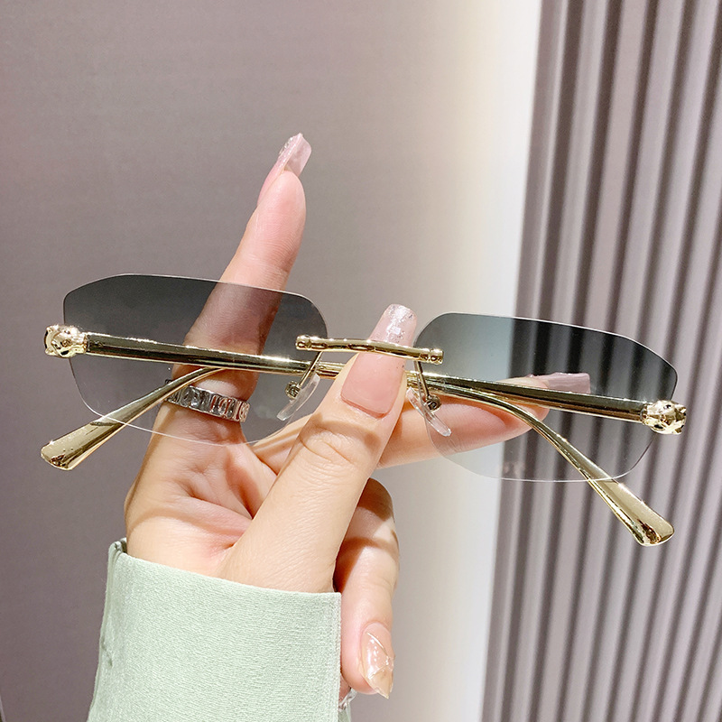 Classic Designer Sunglasses for women Metal Frameless Oval Sunglasses Rimless Metal Frame Diamond Shape Fashion Small Frame Shades Ins Eyeglasses Vint